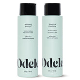Odele smoothing shampoo bottle showing frizz control and shine benefits.