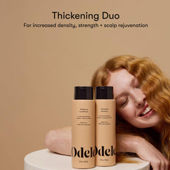 Odele Thickening Conditioner bottle close-up emphasizes hair strengthening for straight to wavy textures.