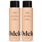Odele Thickening Shampoo bottle on display highlighting density boost and refreshing scent.