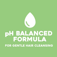 Close-up of coconut Miracle Oil blend for nourishing hair care.