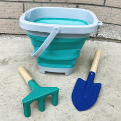 OKGD metal shovel with wooden handle, sturdy digging for young explorers.