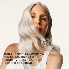 Olaplex N°5P dispensing bottle demonstrates even distribution for detangling.