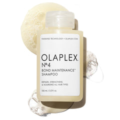 Olaplex No. 4 bottle showcases color-safe shampoo for smoother, healthier hair.