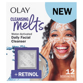 Olay Cleansing Melts pad dissolving in water to begin cleansing and lifting oils