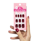 Olive and June Super Stick Mani Mulberry Maroon nails on hand show a salon-style finish