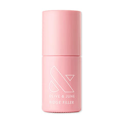 Olive & June Ridge Filler bottle ready to smooth ridges for a flawless base.
