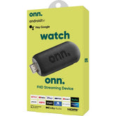 ONN Android TV 2K FHD streaming stick close-up highlighting compact setup for living room use.
