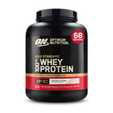 Optimum Nutrition Gold Standard whey tub Cookies & Cream on counter highlights protein strength