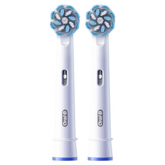 Oral-B Gum Care round head design for tooth-by-tooth coverage.