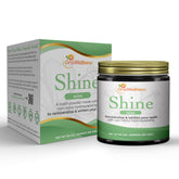 OraWellness Shine powder in a front jar demonstrates gentle whitening and enamel support