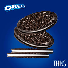OREO Thins with milk image demonstrates classic dunk and savor moment.