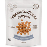 Organic Traditions apricot kernels package front, premium vegan snack option.