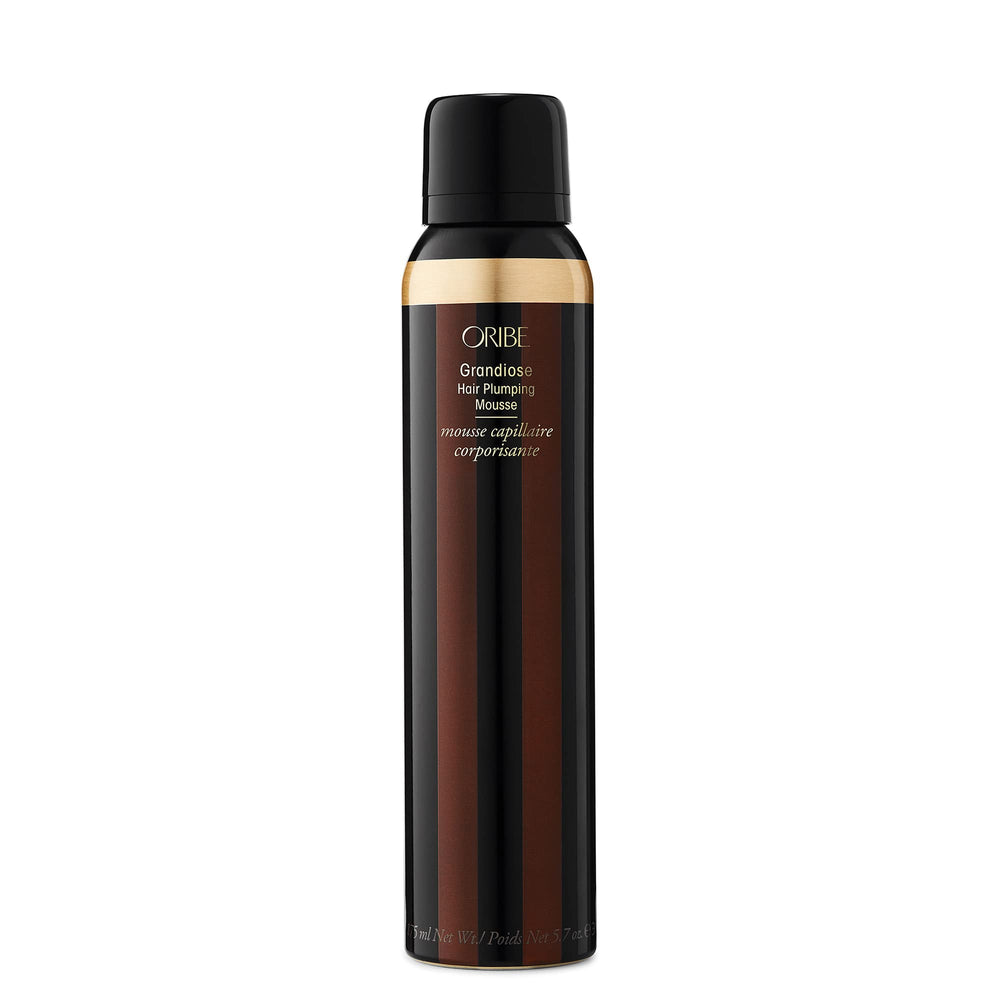 Oribe Grandiose Mousse bottle for voluminous, crunch-free styling with lasting body.
