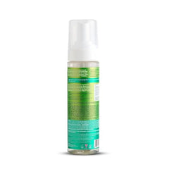 ORS Olive Oil Max Moisture mousse applied to textured curls for definition.