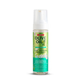 ORS Olive Oil Max Moisture mousse packaging on shelf, travel-friendly 7 oz bottle.