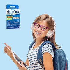 Orvance OrthoDots Clear moisture-activated adhesion at brace edges.