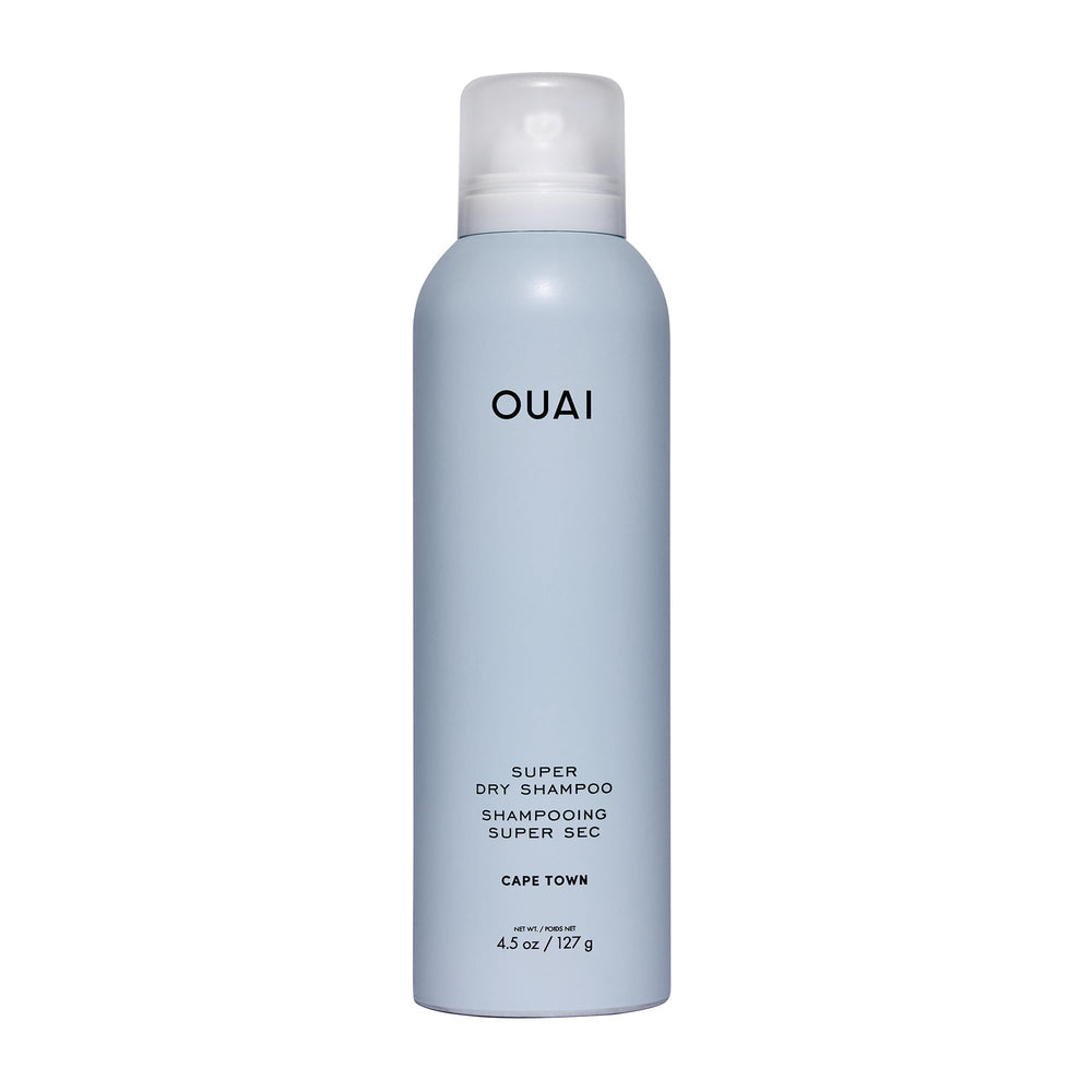 OUAI Super Dry Shampoo bottle shows Cape Town scent and oil-absorbing power for refreshed hair.