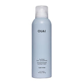 OUAI Super Dry Shampoo bottle shows Cape Town scent and oil-absorbing power for refreshed hair.