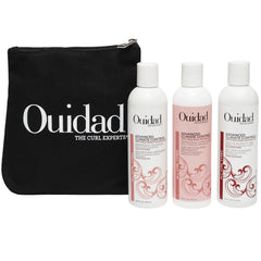 Ouidad Frizz-Free Wash Day Kit shampoo bottle showcases humidity defense for defined curls.