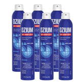 Ozium 8 oz bottle sprays to deodorize a car interior.