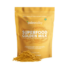 Paleovalley Golden Milk bottle with turmeric highlights, suggesting an immune-support blend.