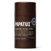 PAPATUI Coconut Woods tattoo stick bottle demonstrates mess-free hydration for tattoos.