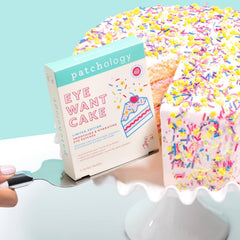 Patchology Eye Want Cake patches being applied under the eyes for quick hydration.