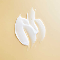 Creamy PATTERN Leave-In texture shown on damp hair for styling prep.