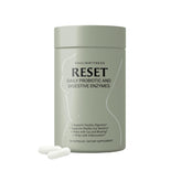 Paulina Fitness Reset Daily Probiotic bottle closeup showcases convenient daily gut support.