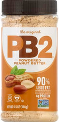 PB2 jar with spoon ready to mix into smoothies.