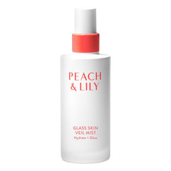 Peach & Lily Glass Skin Veil Mist bottle close-up with cucumber infusion for refreshed skin.