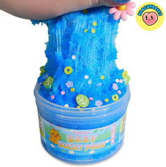 Peachybbies slime with flower sprinkles and leaves evokes a spring pond vibe