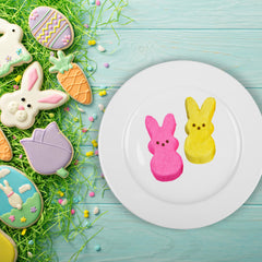 Colorful Peeps pink and yellow bunnies arranged for celebration