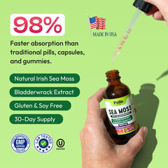 Dropper pouring a 2ml dose from Pella Nutrition Sea Moss Drops