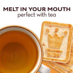 Pepperidge Farm Chessmen Salted Caramel cookies in a bowl beside coffee.