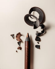 Wear test of Persona 24HR Chocolate Eyeliner Pencil demonstrates smudge-proof definition.
