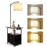 PESRAE floor lamp with table and drawers, compact bedside storage at hand.