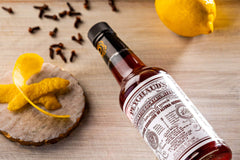 Peychaud's label closeup emphasizes heritage and premium packaging.