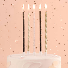 PHD CAKE glitter black and white candles add contrast to cakes.