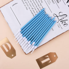 PHD CAKE blue long thin candles create dramatic toast ambiance