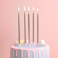 PHD CAKE Champagne Gold taper candle creates wedding cake drama and shine