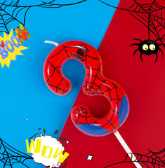 PHD CAKE Spider candle holder included keeps wax off the cake.