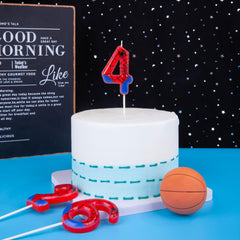 PHD CAKE spider-themed cake decor adds playful party vibe.