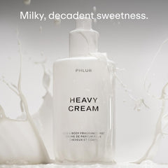 PHLUR Heavy Cream Body Mist spray on hair for subtle scent without overpowering.