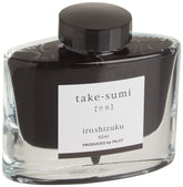 PILOT Iroshizuku Take-Sumi bottle cap close-up, deep black bamboo charcoal ink.