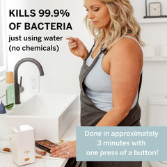Pixie Cup Steam Cleaner steam bath with visible steam for chemical-free sterilization.