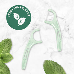 Mint flavor on Plackers floss picks for long-lasting freshness.