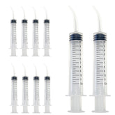 PlastCare USA 12ml disposable curved-tip syringe for dental irrigation in clinical care.