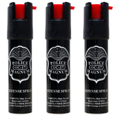 Police Magnum compact pepper spray canister in hand for personal safety.