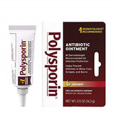 Polysporin first aid ointment tube close-up for quick wound protection.